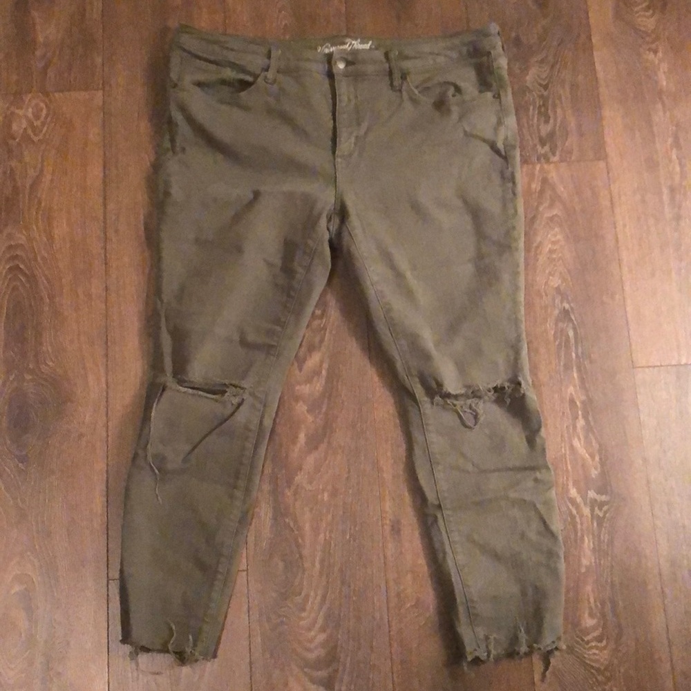 Olive green distressed skinny jeans
